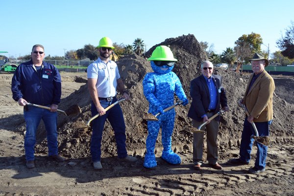 City officials break ground Thursday for a new water treatment plant expected to produce high-quality water. Left to right are Council's Stuart Lyons, Utilities Manager John Souza, AquaBob, Councilmembers Dave Brown and John Plourde.